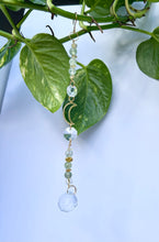 Load image into Gallery viewer, Celestial home décor mini suncatcher with gold moon, prism, and colorful gemstone accents
