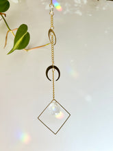 Load image into Gallery viewer, Close-up of double gold moon charms and prism on gold chain
