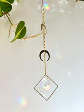 Load image into Gallery viewer, Prism bead detail creating rainbow light from double gold moon suncatcher
