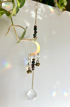 Load image into Gallery viewer, Handmade gold half moon suncatcher with crystal beads, prism accents creating rainbow reflections
