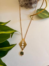 Load image into Gallery viewer, Close-up of labradorite gemstone in a witchy moon phases gold necklace
