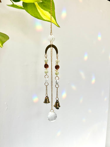 Mini gold charm suncatcher with Rudraksha and Aventurine beads hanging on gold chain