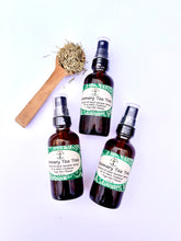 Load image into Gallery viewer, Rosemary and Tea Tree yoga mat cleaner shown with fresh herbs
