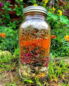 Loose Herbs in a Mason Jar – Organic Calendula, Mullein, and Chamomile Stored for Skincare Infusion, Ready for Natural Oil Extraction.